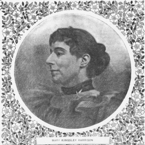 Head-and-shoulders photograph of Lucas Malet, albumen print, c. 1894. She is seen in profile. with strong features and dark wavy hair in a bun on the nape of her neck. She has a dark choker round her neck and a deep frill edging her dress. The oval portrait has a leaf-pattern background with Malet's non-literary name in capitals: "Mary Kingsley Harrison".