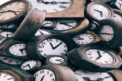 pile of wall clocks